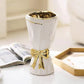 White and Gold Bow Vase
